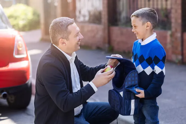 imgi_3_side-view-father-kid-first-day-school_23-2149748232